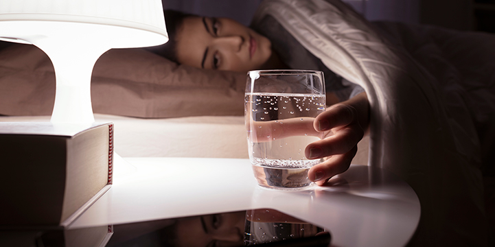 woman-drinking-a-glass-of-water-at-night-E8CM6WF Plan your test